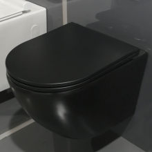 ПРОМО СЕТ черна тоалетна Carlo Rimpless, структура Grohe и златен бутон Skate Cosmopolitan  